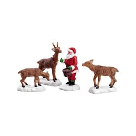 Santa Feeds Reindeer Figurines Set of Four